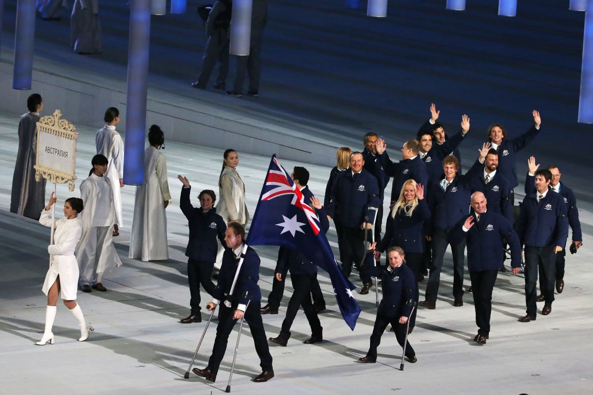Australia enters the stadium led by skier and flag bearer Cameron Rahles-Rahbula.