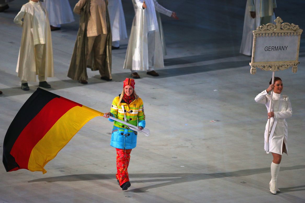 Skier Andrea Rothfuss carries the flag for Germany.