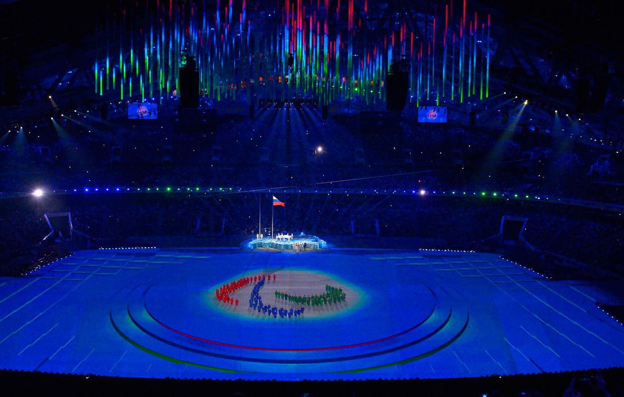 The Paralympic flag is raised during the ceremony.
