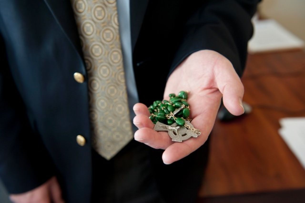 Bob Bowers, a former priest, still keeps rosary beads in his pocket. - (Webb Chappell for CNN)