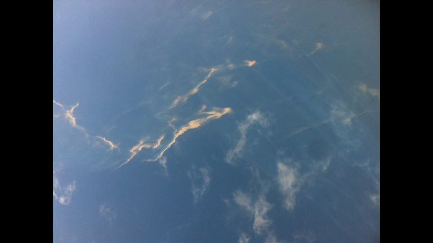 epa04115540 A handout picture provided by Tienphong.vn shows what is believed to be an oil slick stretching a length of about 15-20 km in the sea off the Vietnamese coast, 08 March 2014. The slick is one of two oil slicks spotted off the country's coast by Vietnamese search and rescue planes while looking for a missing Malaysia Airlines passenger jet. The oil slicks were seen at 5:20 pm (1030 GMT), one 150 kilometres from Tho Chu island and the other 190 kilometres from Ca Mau cape, Pham Quy Tieu, deputy minister of transport said. The slicks were suspicious, he added, but it was not confirmed they were caused by the aircraft. A major international search effort was underway for a China-bound Malaysia Airlines plane carrying 239 people that is feared to have crashed in the South China Sea.  EPA/TIENPHONG.VN / HANDOUT BEST QUALITY AVAILABLE. HANDOUT EDITORIAL USE ONLY/NO SALES