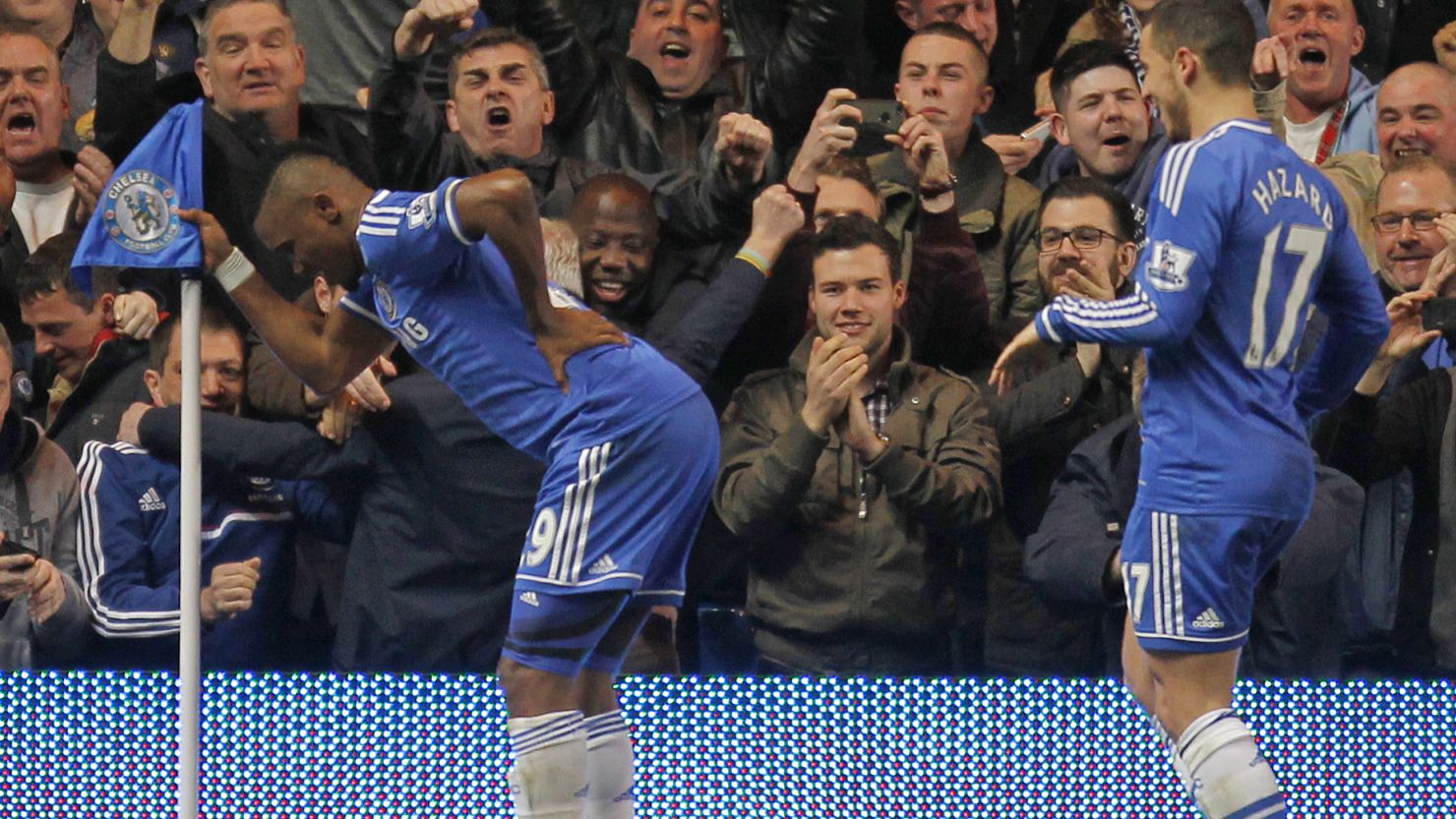 Samuel Eto'o mounts an unusual goal celebration after putting Chelsea ahead against Tottenham.