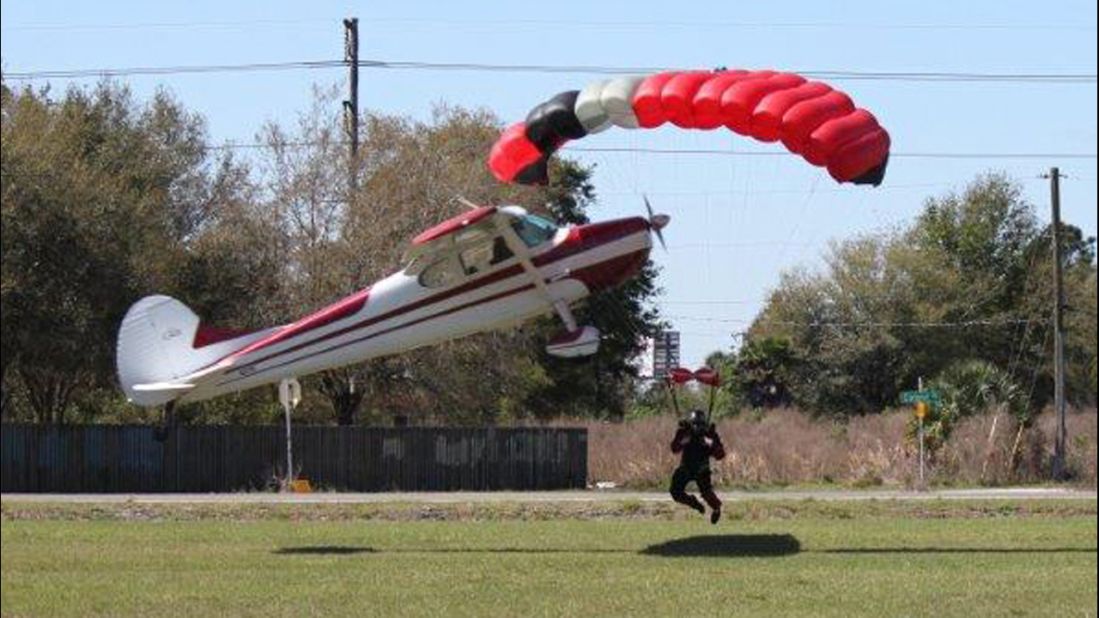 The plane took a nosedive and the skydiver was thrown to the ground.