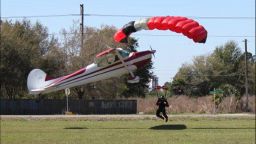 Parachutist collides with small plane in Mulberry Florida. Parachutist and pilot had non-life threatening injuries Credit: 	via witness Tim Telford
Photographer: 	Polk County Sheriff