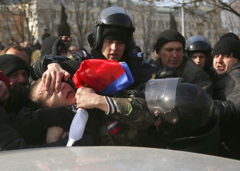 Ukrainian police detain a demonstrator during a pro-Russian rally in Donetsk on March 9. 
