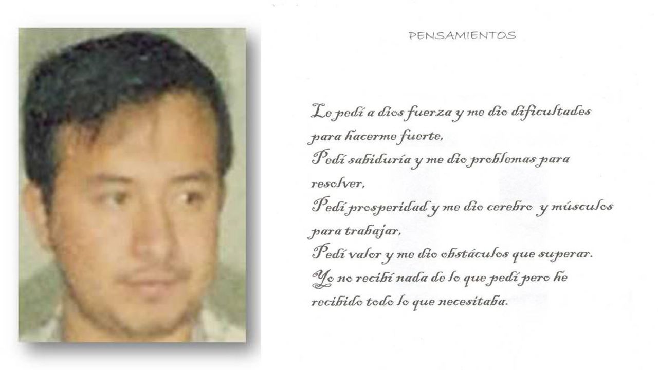 A photo of Nazario Moreno is seen on a page of a book that he wrote.