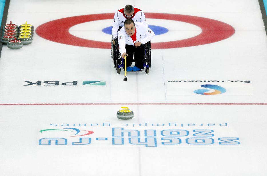 Bob McPherson of Great Britain competes in a mixed curling match versus Sweden on March 9. 