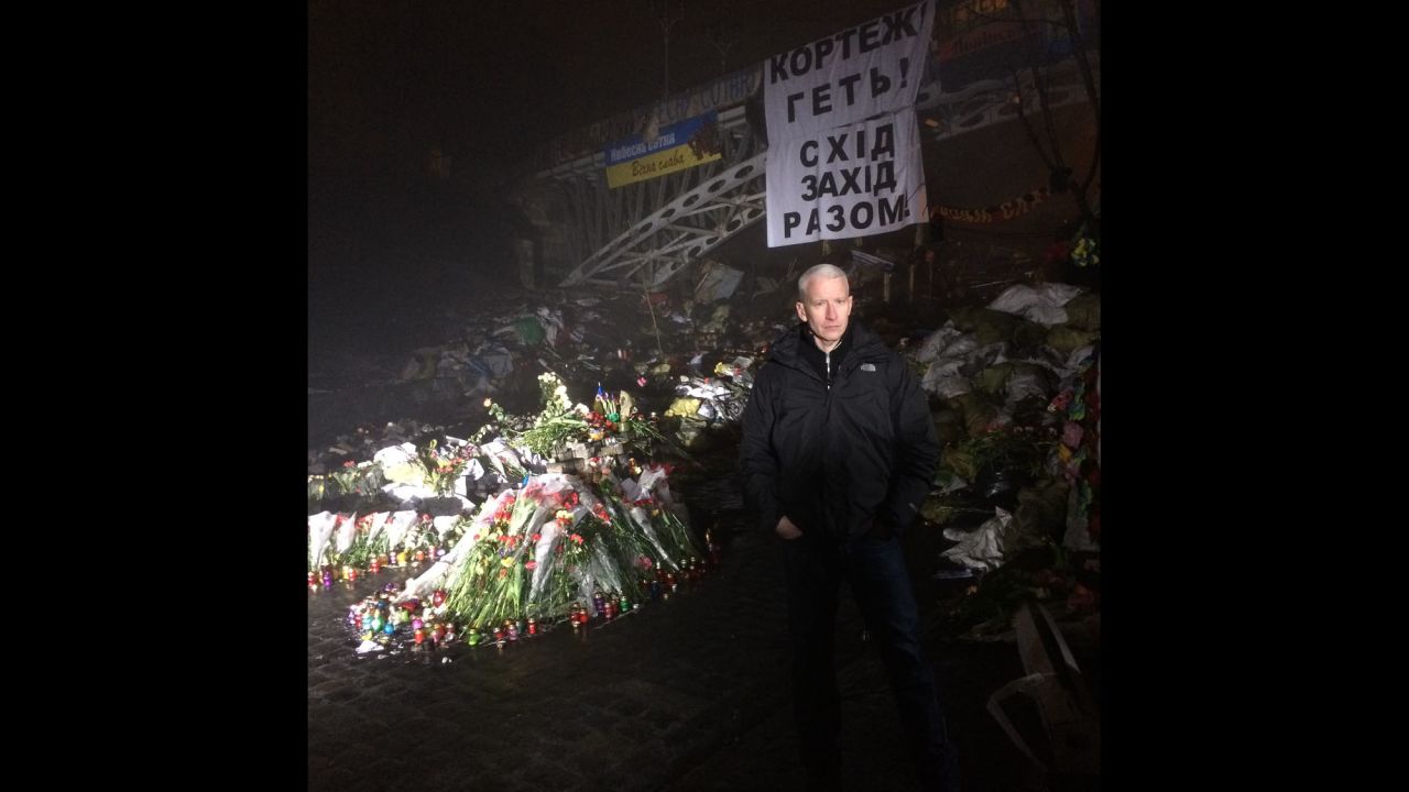 KIEV, UKRAINE:  CNN's Anderson Cooper reports from Kiev's Independence Square on March 6.  Photo by CNN's Khalil Abdallah.