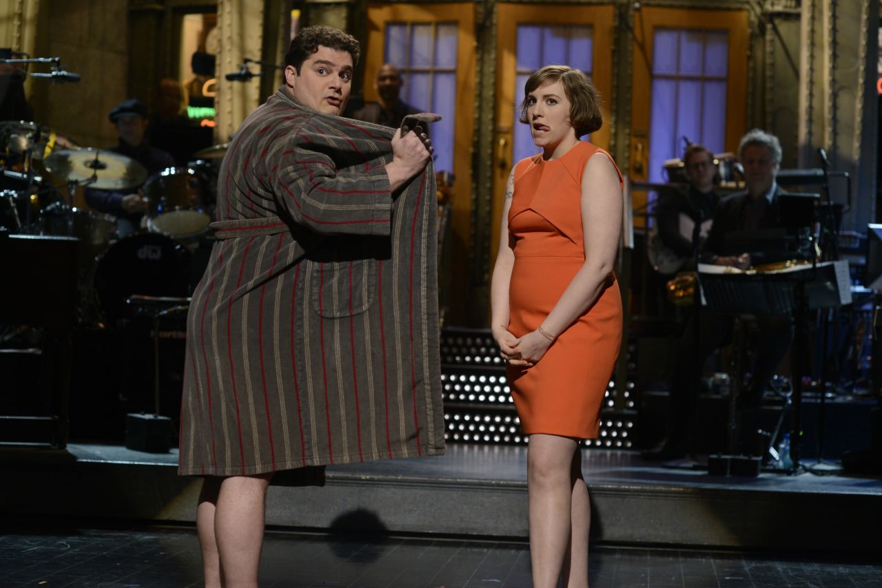 She's also been on other TV shows. In 2014, she hosted "Saturday Night Live." Here, she shares a moment with Bobby Moynihan.
