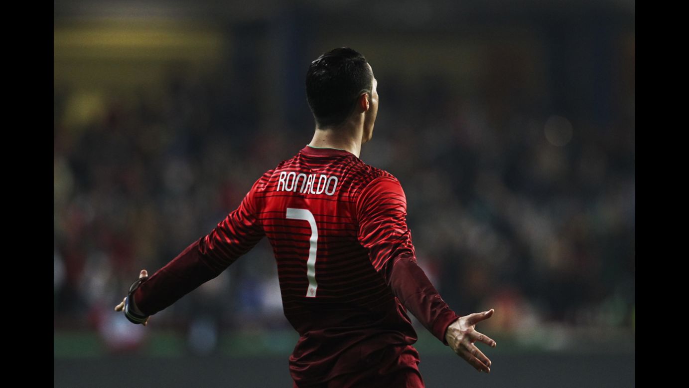 Portugal's Cristiano Ronaldo celebrates after scoring against Cameroon during a soccer match Wednesday, March 5, in Leiria, Portugal.
