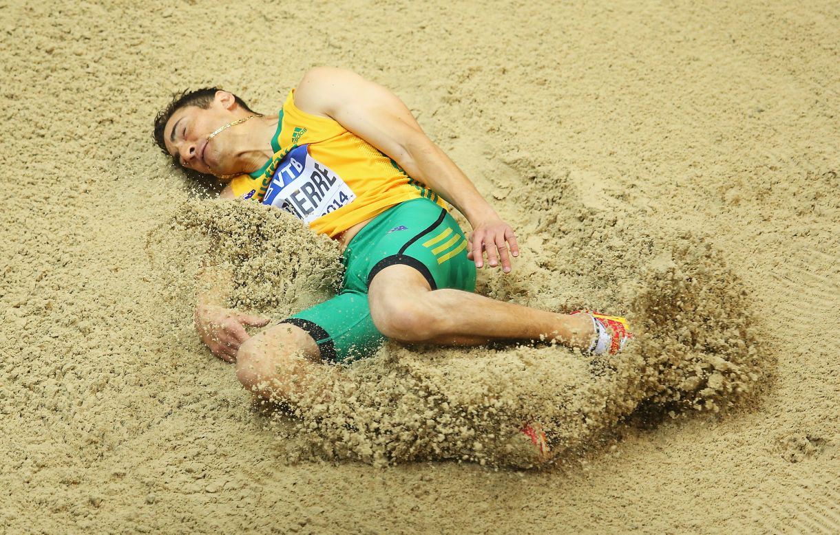 Fabrice Lapierre of Australia lands Friday, March 7, during the men's long jump competition at the IAAF World Indoor Championships in Poland.