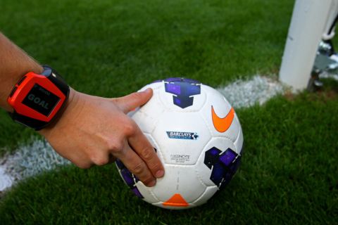 With new "GoalControl" technology, referees will get signals on smartwatches such as this one when cameras detect a ball has crossed the goal line. 