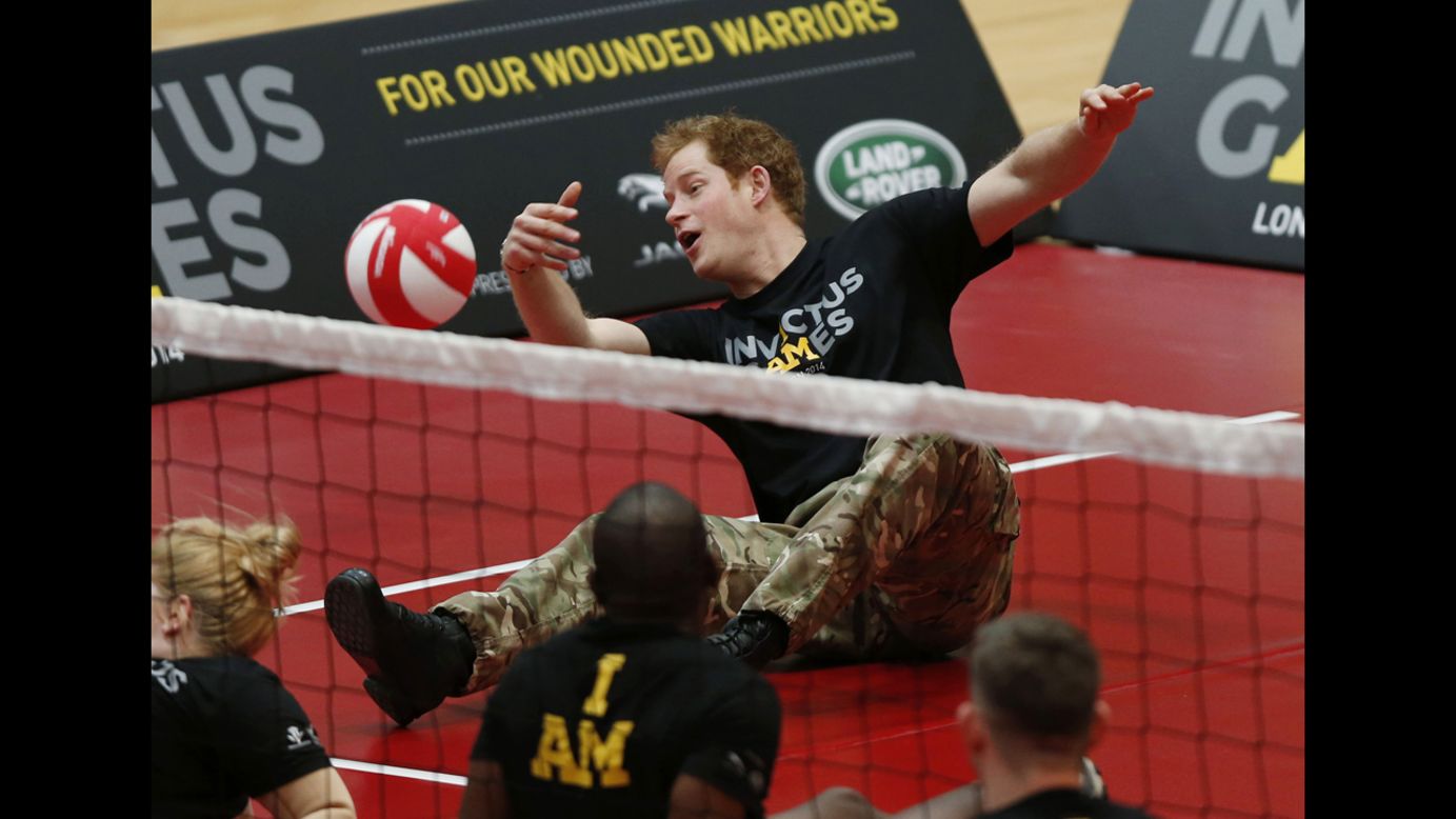 Britain's Prince Harry plays a game of sitting volleyball in London on Thursday, March 6, during the launch of the Invictus Games for wounded troops.