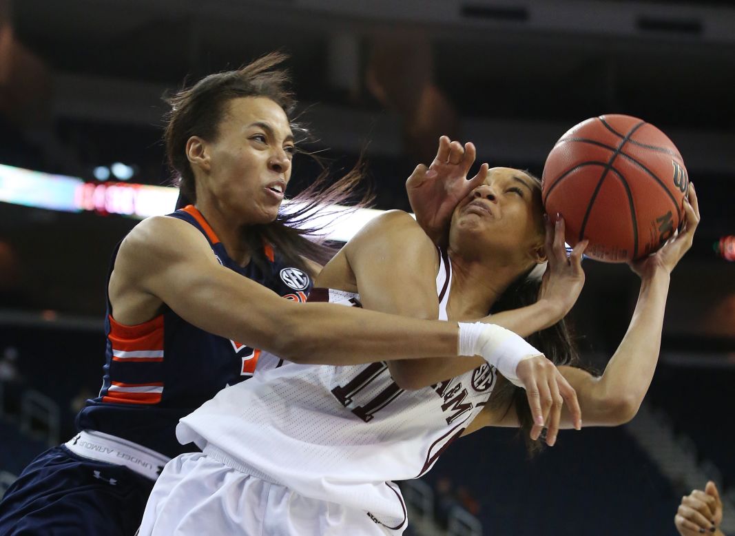 Texas A&M guard Curtyce Knox, right, is fouled by Auburn's Tyrese Tanner in the quarterfinals of the SEC women's basketball tournament on Friday, March 7.