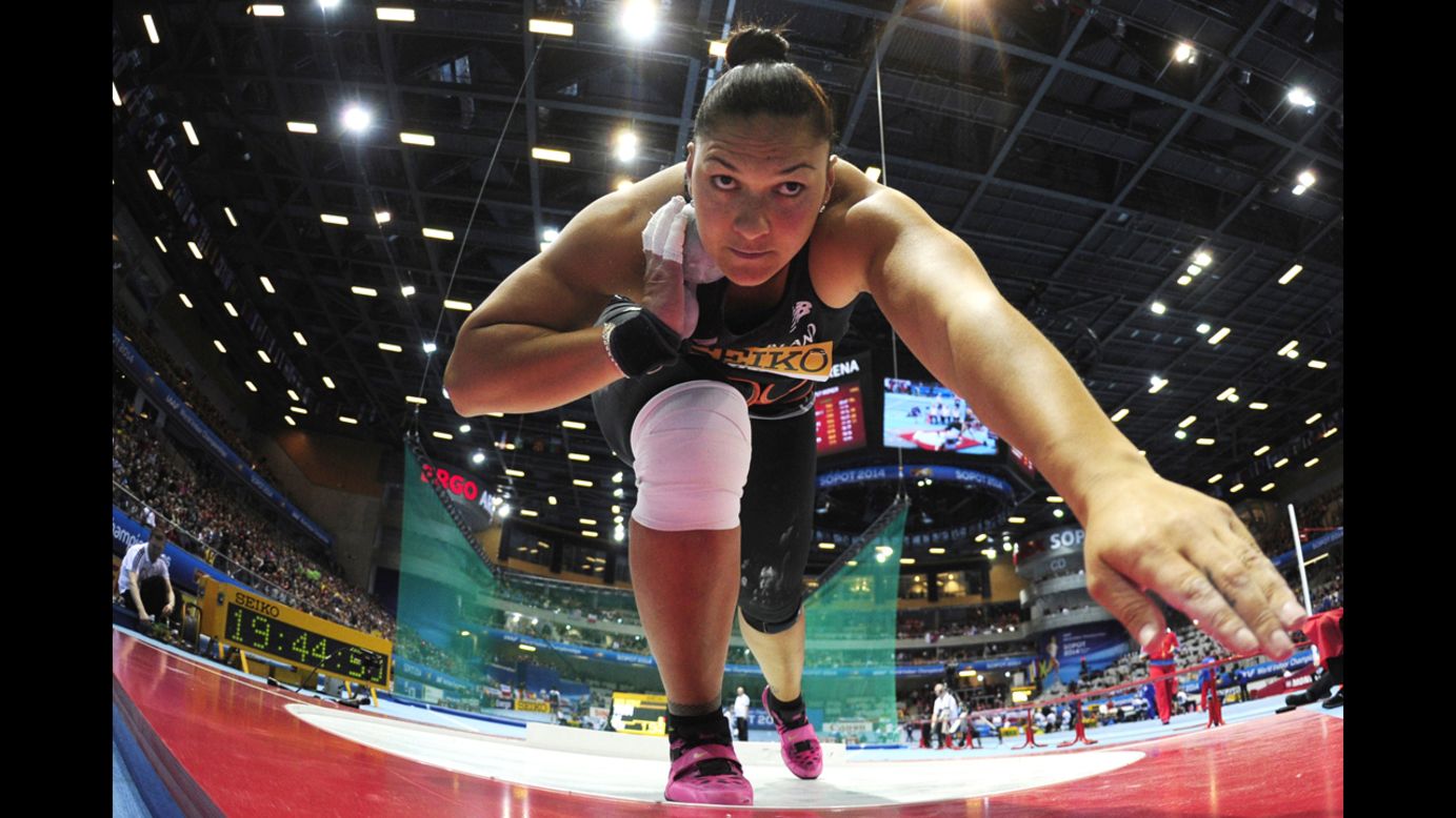 New Zealand's Valerie Adams prepares to throw the shot put Saturday, March 8, at the IAAF World Indoor Championships in Poland.