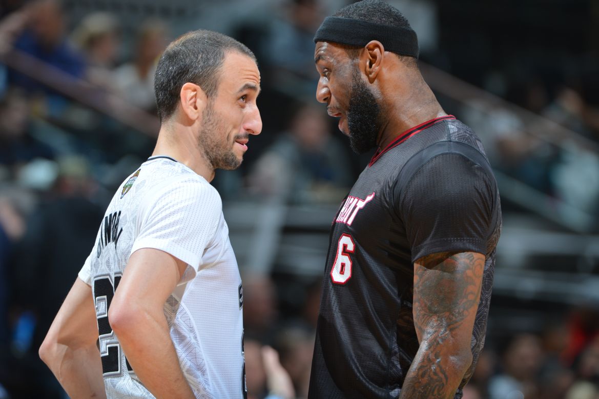 Manu Ginobili of the San Antonio Spurs, left, faces off with LeBron James of the Miami Heat during an NBA basketball game Thursday, March 6, in San Antonio.