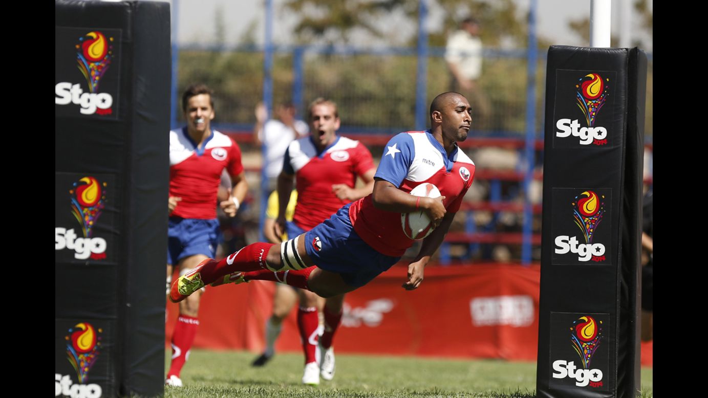Leonardo Montoya of Chile jumps to score at try Saturday, March 8, during rugby qualifiers at the South American Games in Santiago, Chile. <a href="http://www.cnn.com/2014/03/04/worldsport/gallery/what-a-shot-0304/index.html">See 38 amazing sports photos from last week.</a>