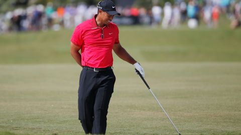 Tiger Woods grimaces during the final round of he WGC Cadillac Championship on Sunday.