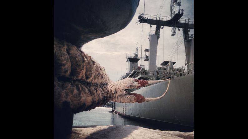 SEVASTOPOL, UKRAINE:  The Ukranian Navy vessel Slavutych remains blocked by Russian Navy boats inside the Port of Sevastopol on March 10, photographed by CNN's Christian Streib.  Follow Christian on Instagram at <a href="https://trans.hiragana.jp/ruby/http://instagram.com/christianstreibcnn" target="_blank" target="_blank">instagram.com/christianstreibcnn</a>.