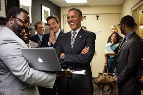 President Barack Obama lets out a laugh as he is briefed by host Jimmy Fallon and his producers on the "Slow Jam the News" segment before his appearance on "Late Night with Jimmy Fallon" in April  2012. 