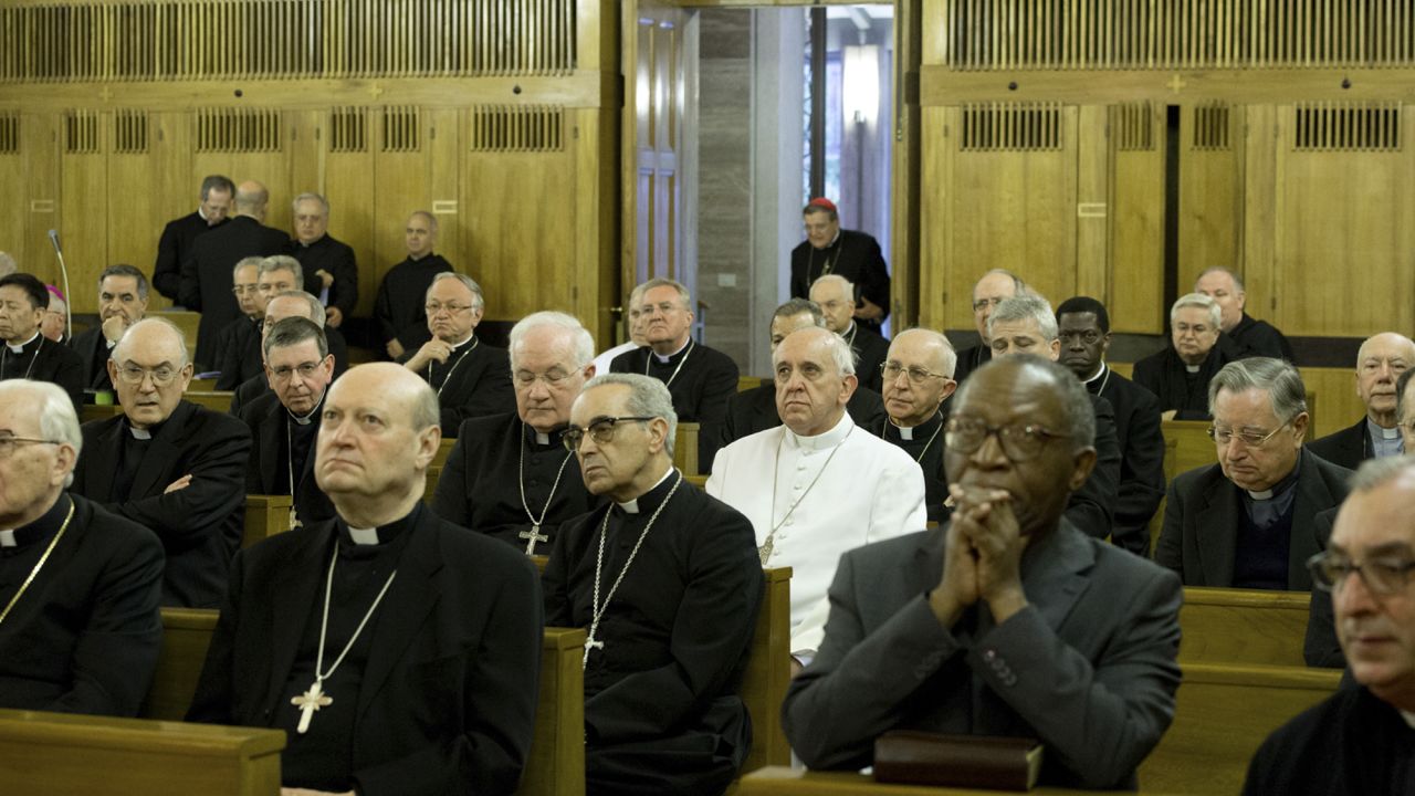 Pope Francis sits among bishops and cardinals at their recent annual retreat, as one of many.