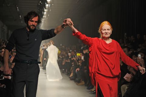 "Buy less, choose well, make it last," she told the crowd gathered at London's Southbank arts centre. Here she is pictured with husband Andreas Kronthaler at Paris Fashion Week last year.