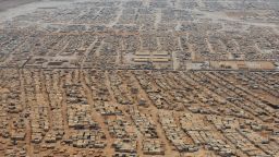 An aerial view shows the Zaatari refugee camp on July 18, 2013 near the Jordanian city of Mafraq, some 8 kilometers from the Jordanian-Syrian border. The northern Jordanian Zaatari refugee camp is home to 115,000 Syrians.