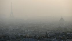 Photo taken on March 11, 2014 shows the Eiffel tower and Paris' roofs through a haze of pollution. French non-governmental organization (NGO) Ecologie Sans Frontiere (Ecology without borders) confirmed on March 11 that they had filed a criminal complaint in Paris to denounce the 'health scandal' of air pollution, as several regions of France experienced high levels of particulate pollution. AFP PHOTO / PATRICK KOVARIK (Photo credit should read PATRICK KOVARIK/AFP/Getty Images)