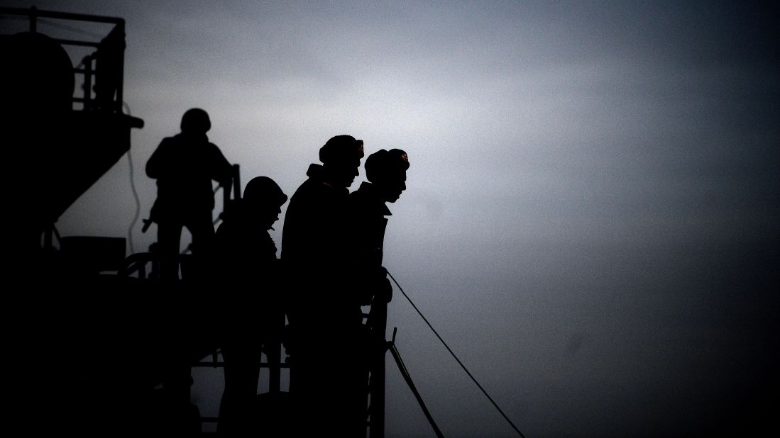 Soldiers are seen aboard the Ukrainian ship Slavutych in the harbor of Sevastopol on Tuesday, March 11.