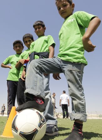 Football's world governing body FIFA donated t-shirts to children at the Zaatari refugee camp last year. The organization Save the Children has also built a football pitch inside the camp.