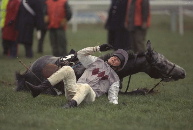 But Dunwoody insists he doesn't miss the rigors of horse racing and the ensuing falls, such as this one on Spring Hay.