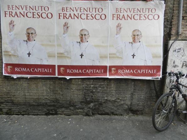 Posters in Rome welcomed the new pope after his inauguration.