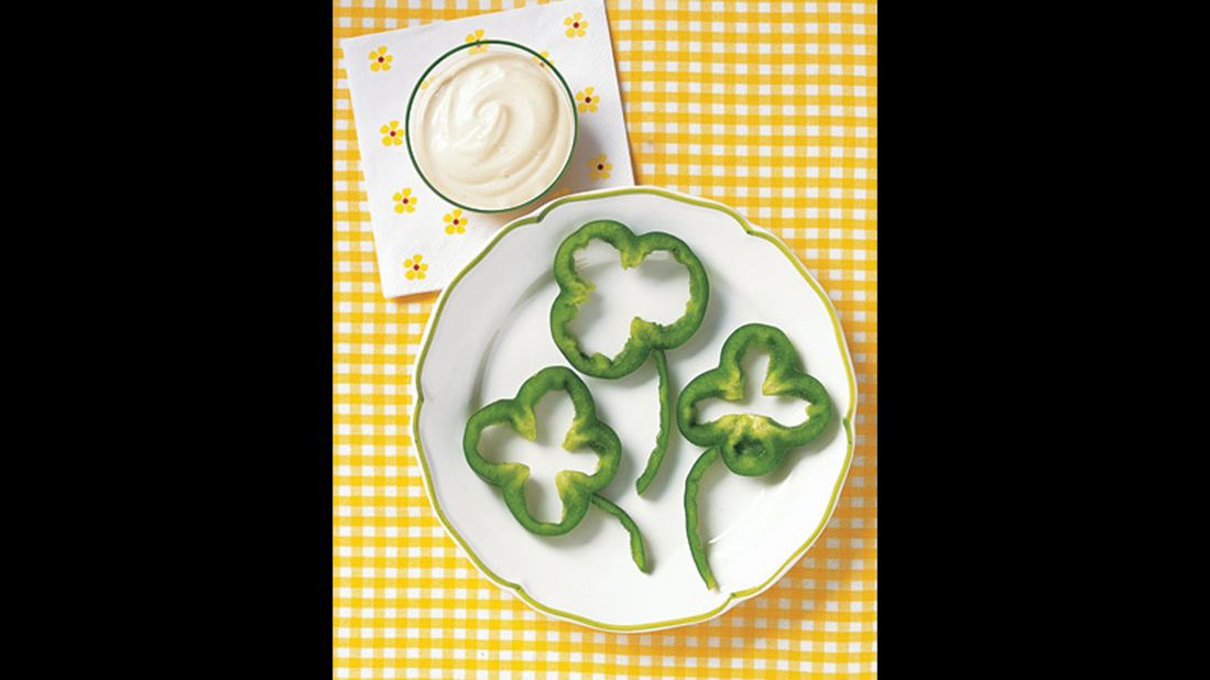 Dress up any St. Patrick's Day meal by adding shamrocks made of green peppers to your plate. Slice a green bell pepper widthwise; it will reveal a shamrock or lucky four-leaf clover shape. Slice another pepper lengthwise to create stems. You can also present it to kids as a lucky snack -- just serve with your child's favorite dip.