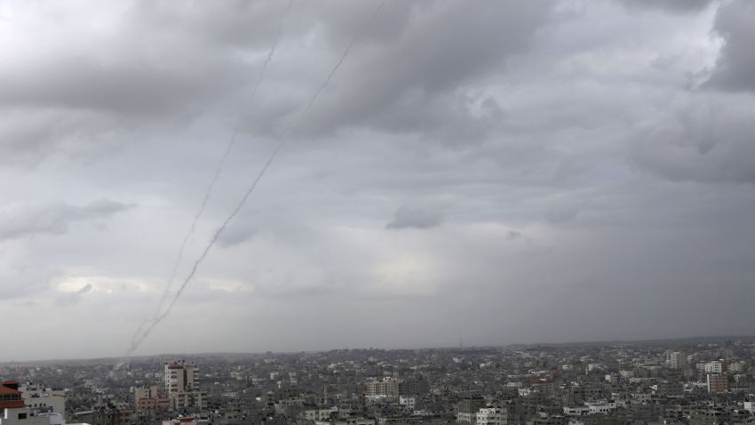 A trail of smoke from rockets fired by Palestinian militants from Gaza toward Israel is seen above Gaza City on Wednesday, March 12, 2014.