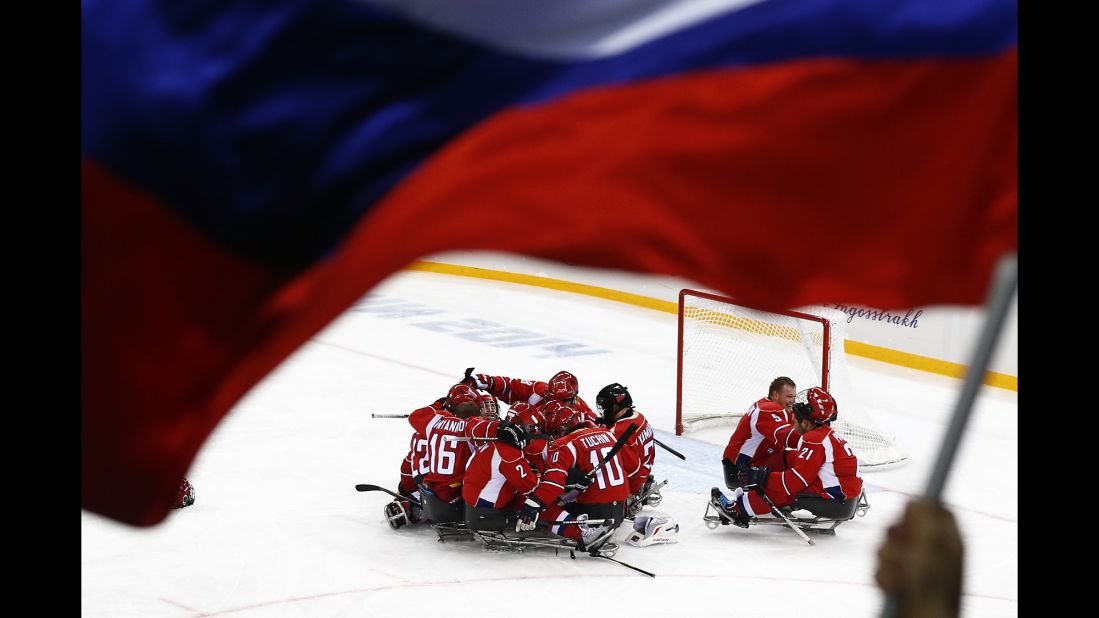 Russia's men's hockey team celebrates after winning a semifinal match against Norway on Thursday, March 13.