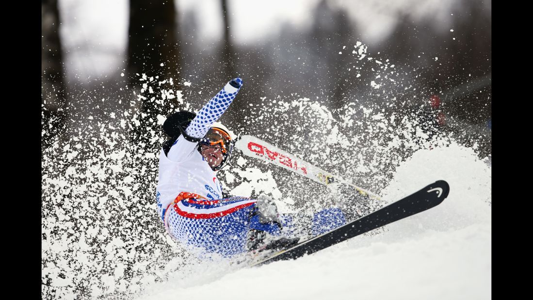 Aleksandr Akhmadulin of Russia crashes in the men's slalom on March 13.