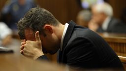 Oscar Pistorius reacts during his trial at the high court in Pretoria, South Africa, on March 13, 2014.