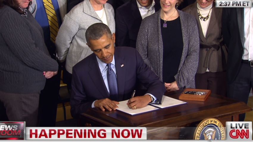 nr obama signs presidential memorandum overtime_00024127.jpg