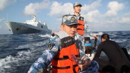 Members of the Chinese Navy continue search operations near the Chinese vessel Jianggangshan on March 13.
