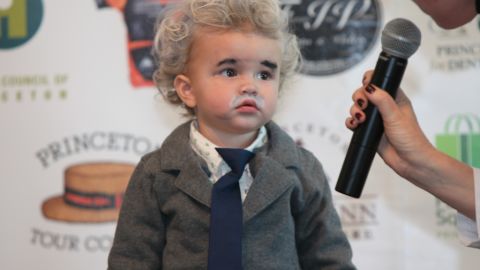 In Princeton, New Jersey, a child dresses up as Albert Einstein for Pi Day 2013.