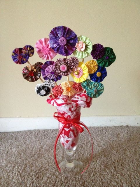 A fabric-flower hair clip display made as a raffle gift for a fundraiser for <a href="http://www.anabelleswish.org" target="_blank" target="_blank">Anabelle's Wish</a>, a charitable organization in Anabelle's name to assist families who have children with rare neurological disorders.  