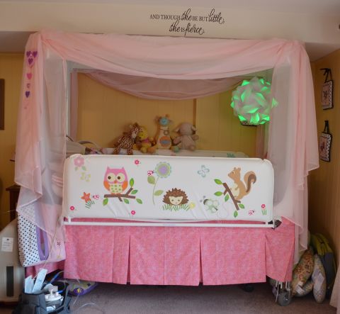 Anabelle outgrew her crib this year, but still needed something to contain her and prop her in the right sleeping position, so the family got a hospital bed. "It was so medical-looking and looked out of place in our home, so we dressed it up," Linzey said. Elyse designed the stickers.