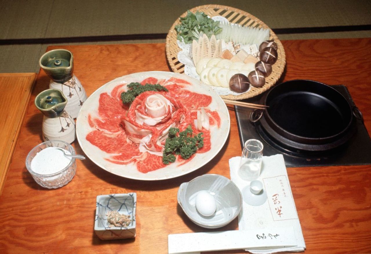 Sukiyaki: mix, simmer, dip in raw egg, emit murmur of satisfaction. 