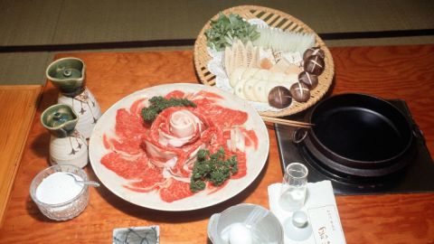 Sukiyaki: mix, simmer, dip in raw egg, emit murmur of satisfaction. 