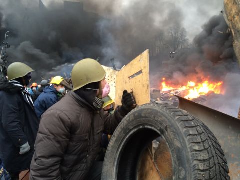 KIEV, UKRAINE:  Anti-government protesters clash with riot police in central Kiev on February 20.  Photo by CNN's Todd Baxter.