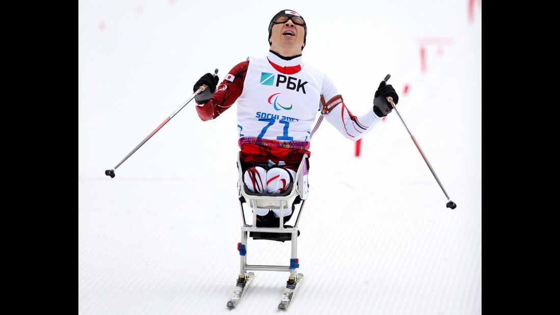 Kozo Kubo of Japan crosses the finish line in the men's biathlon on March 14.