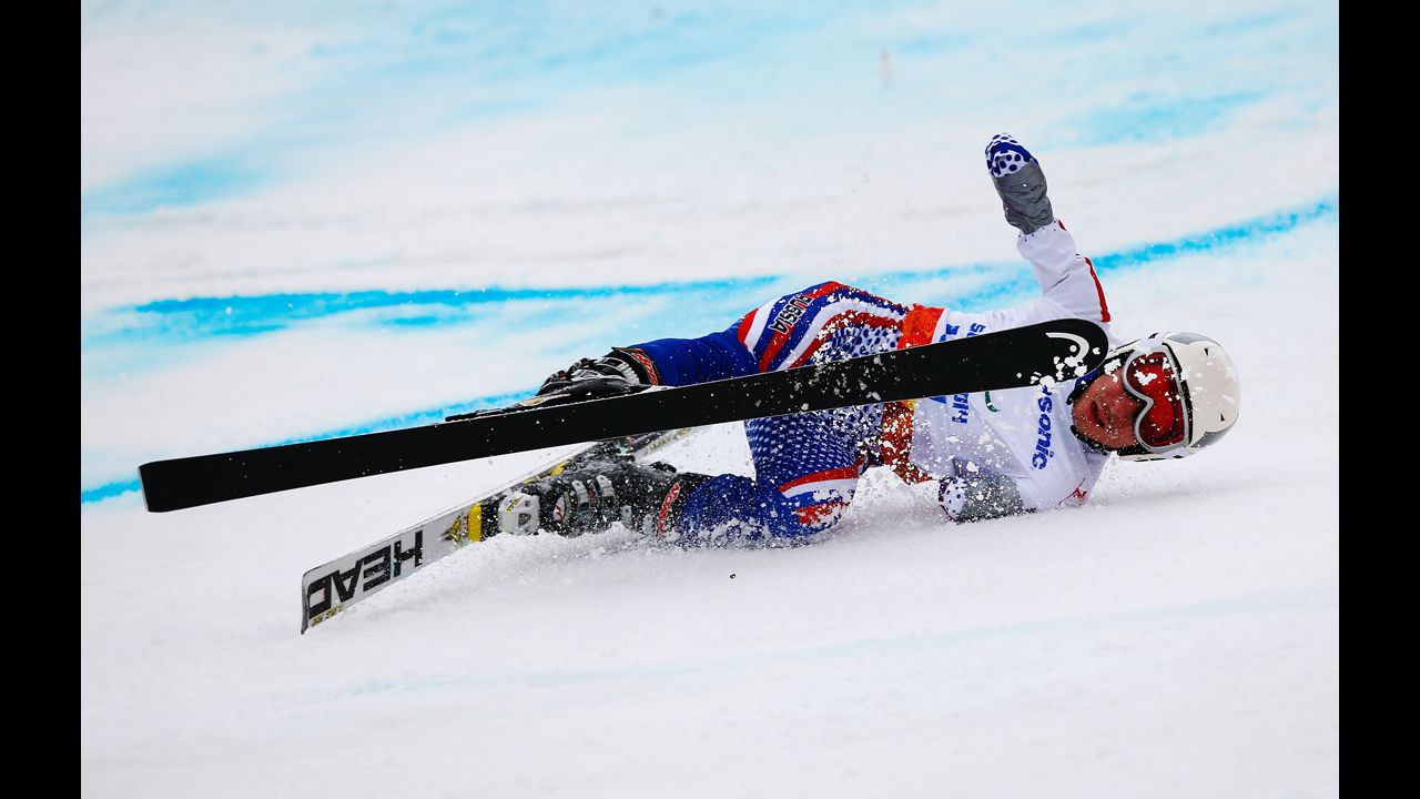 Aleksandr Akhmadulin of Russia crashes in the men's giant slalom standing on March 15.
