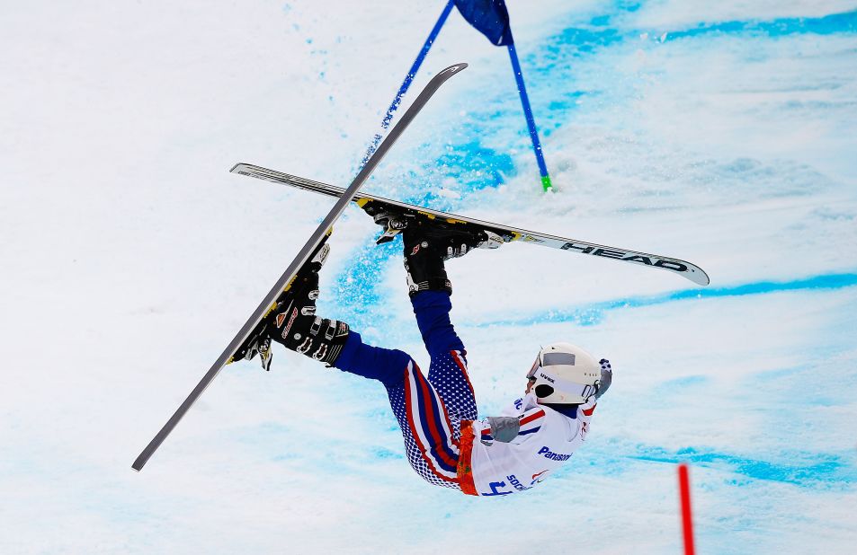 Aleksandr Akhmadulin of Russia crashes in the men's giant slalom standing during day eight of the Sochi 2014 Paralympic Winter Games.