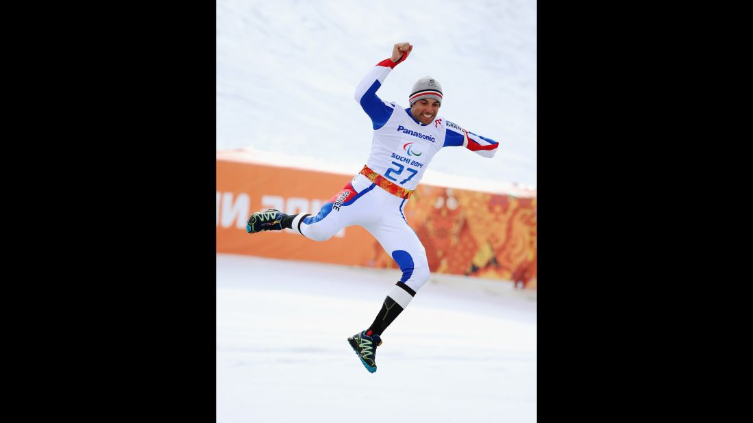 Vincent Gauthier-Manuel of France celebrates winning the gold medal in the giant slalom standing during day eight of the Sochi 2014 Paralympic Winter Games.