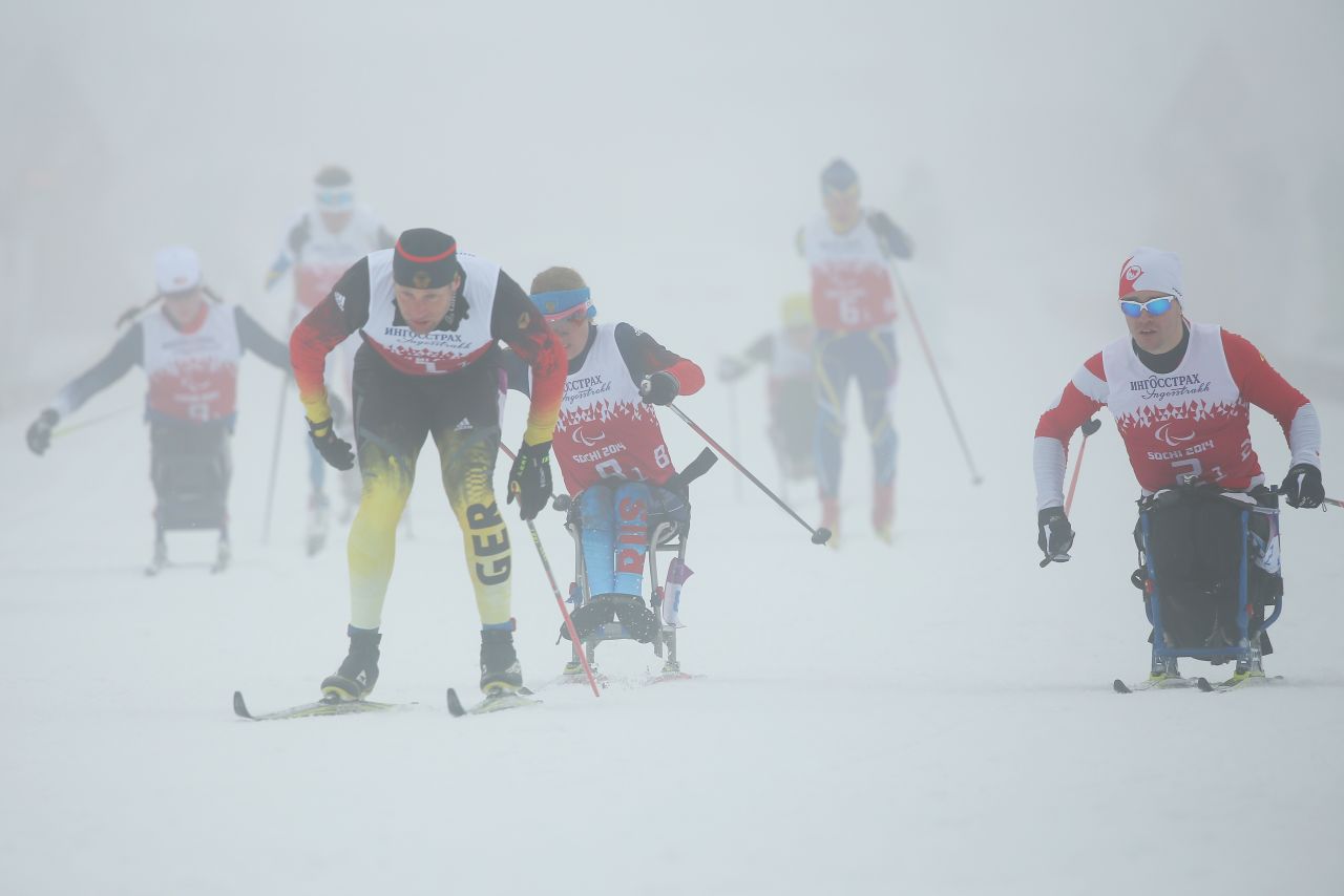 Tino Uhlig of Germany leads the field at the start of the 4 x 2.5-kilometer mixed relay cross-country on day eight of the Sochi 2014 Paralympic Winter Games.